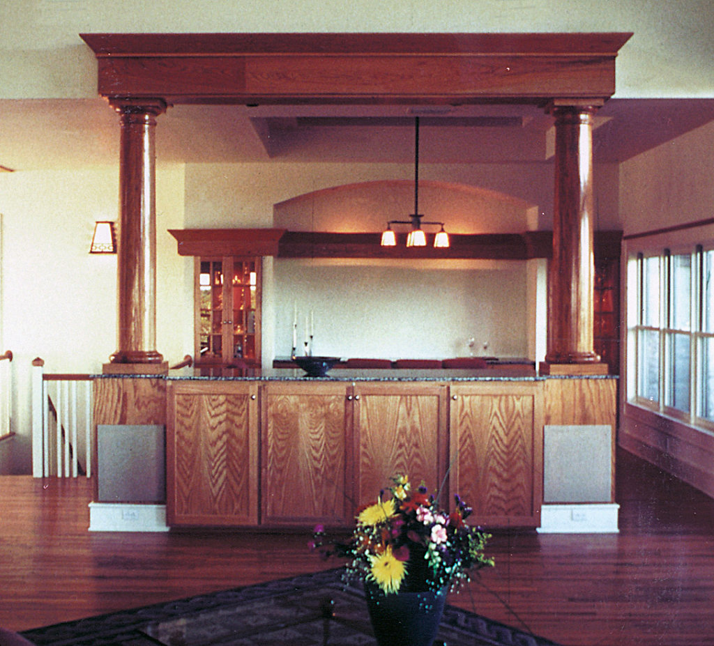 Two Stained Wood Columns on Wet Bar