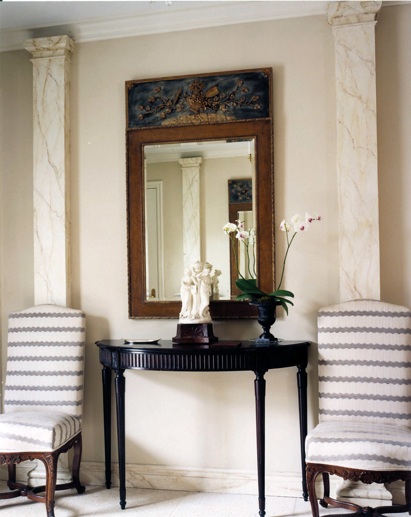 Faux Marble Square Pilasters in a Hallway